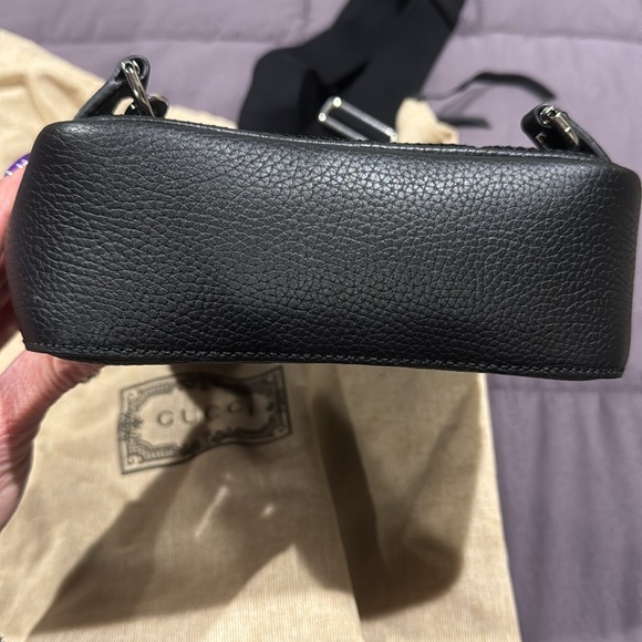 Gucci authentic. Mini jumbo GG crossbody backpack. Never used. - Picture 4 of 7